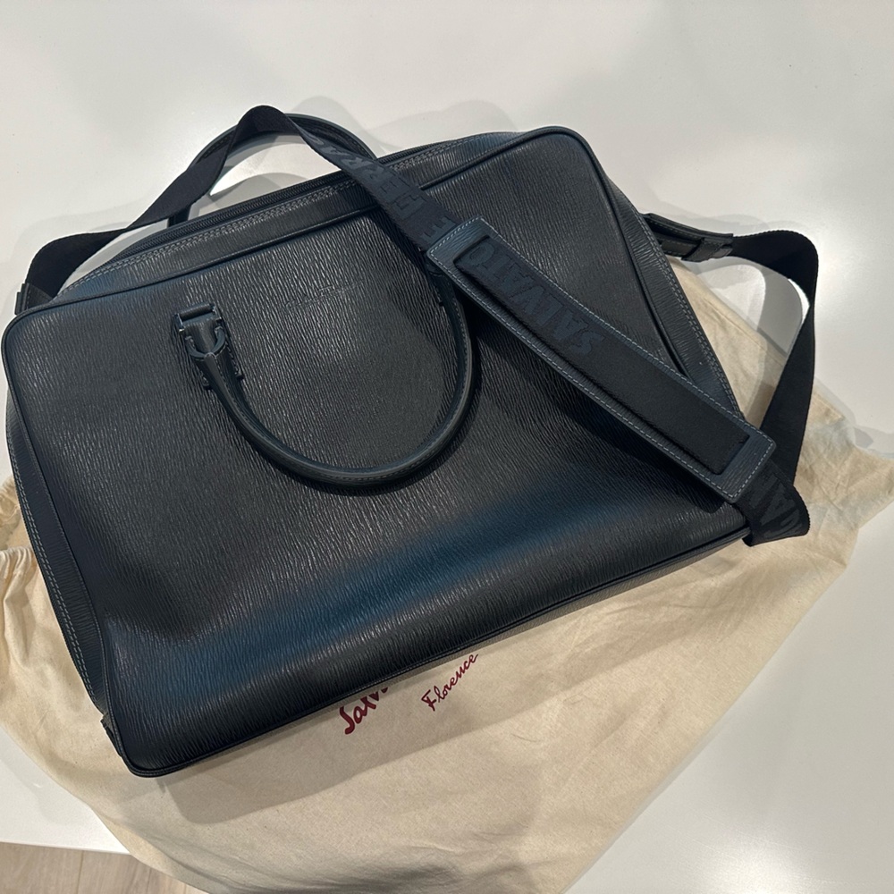 Guaranteed authentic unused black Ferragamo crossbody leather travel briefcase